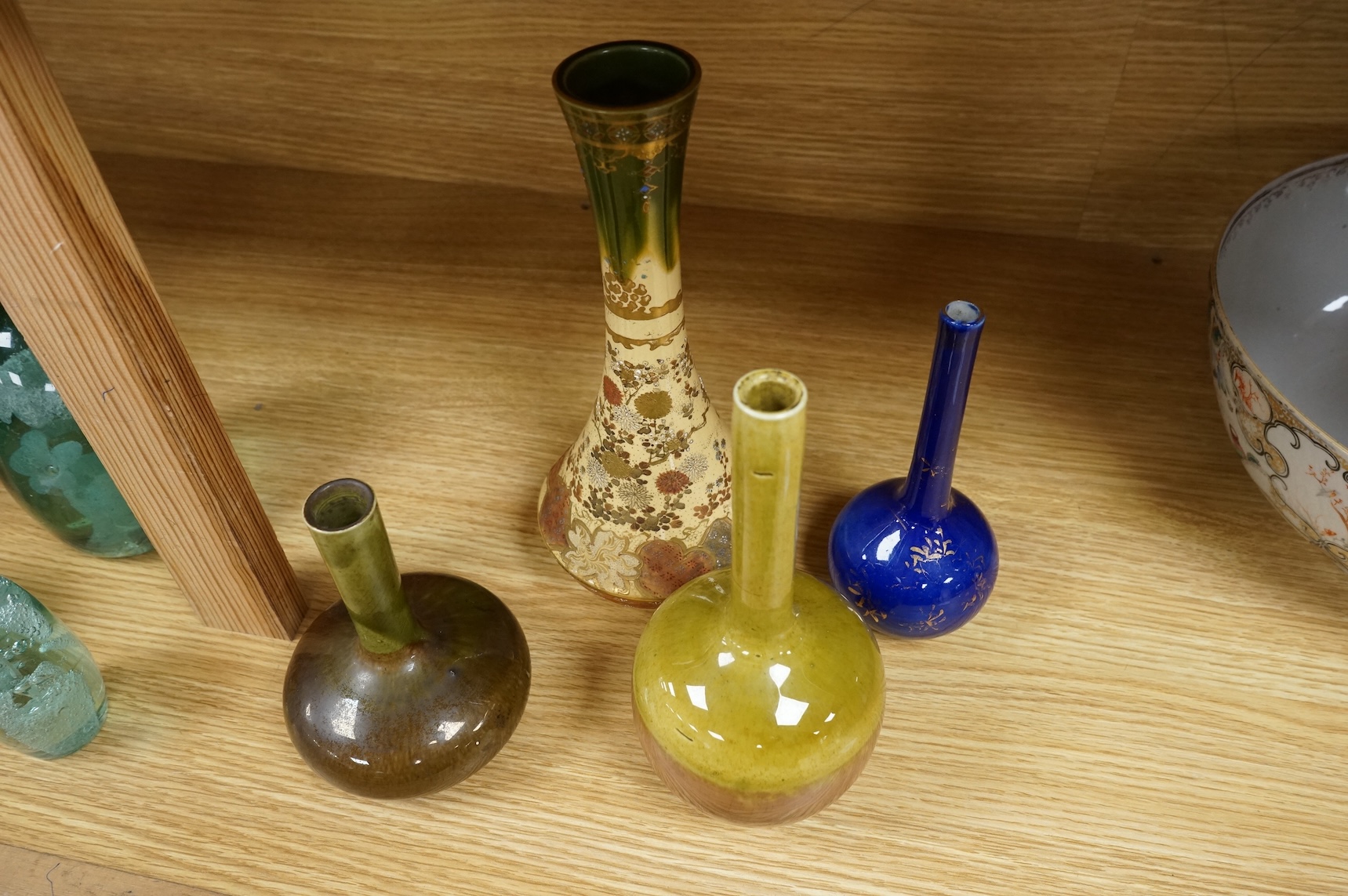 Three Japanese bottle neck vases and a Satsuma example, signed to the base, largest 25cm high